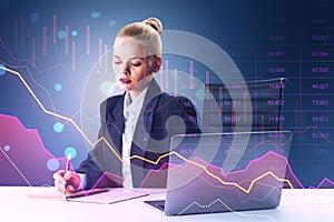 European woman working at desk with laptop and pink crisis business and forex chart on blurry background with bokeh circles.