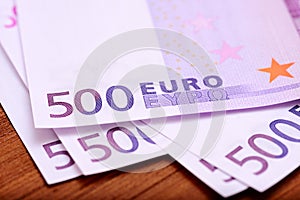 Europian currency euros banknotes on wooden table photo