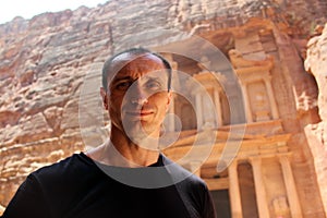 Europian tourist man in Petra in Jordan during a journey photo