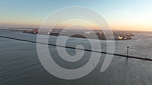 Europoort of Rotterdam. Large industrial port seen from the sea at Hoek van Holland. Callandcanal and north sea. Birds