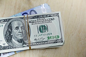 Euros and dollars on table