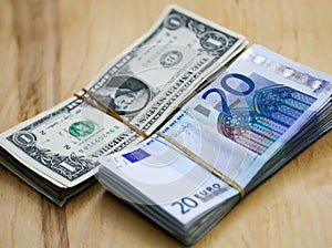 Euros and dollars on table