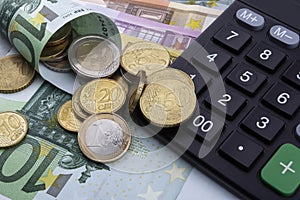 Euros (EUR) and a calculator. Business concept.