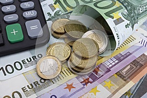 Euros (EUR) notes and coins. Business concept.