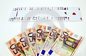 Euros and playing cards, gambling winnings concept
