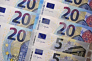 Euros, twenty and five euro banknotes, flat lay