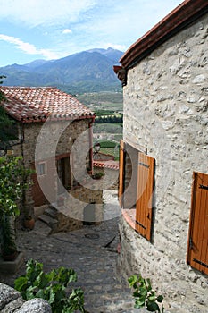 Eus, France. A street with a view.