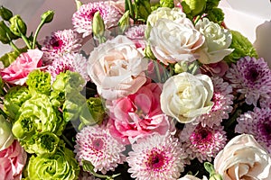 Eustoma, chrysanthemum, green rose. The posy bouquet