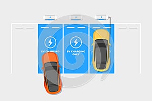 EV Charger stations parking lot. Electric cars charging on empty parking lot area with fast supercharger station.