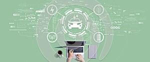 EV concept with person working with laptop