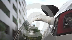 EV electric car charging in green sustainable city innards