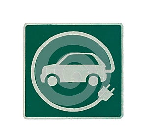 EV - electric vehicle charging station sign. `E` sign on asphalt texture