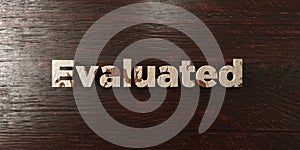 Evaluated - grungy wooden headline on Maple - 3D rendered royalty free stock image photo