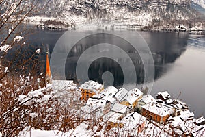 Evangelical steeple and Hallstatt village along the Hallstaetter lake in Austria