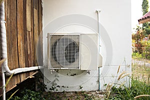 Evaporator Coil & Condenser Coils of air conditioner at outside of house