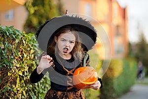 Eve of All Saints' Day. Girl 8-9 years portrays the evil enchantress.