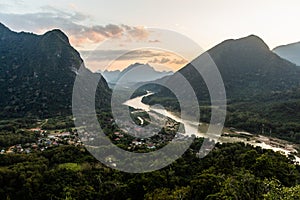 Evening aerial view of Muang Ngoi Neua village and Nam Ou river from Phanoi viewpoint, La