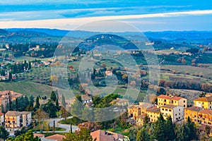 Evening afterglow of the sun on a Tuscan hillside at San-Gimignano, Italy.