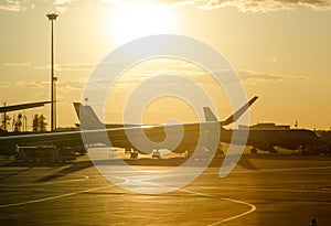 Evening airport in yellow sunset light