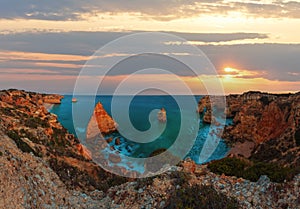 Evening Atlantic rocky coastline top twi;ight view Marinha Beach, Lagoa, Algarve, Portugal