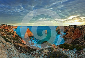 Evening Atlantic rocky coastline top twilight view Marinha Beach, Lagoa, Algarve, Portugal