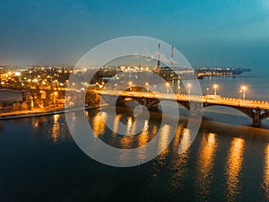 Evening autumn Voronezh. Sunset above Vogresovsky bridge over Voronezh river, aerial view