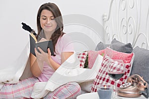 Evening in bed with a book