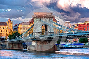 Evening Budapest, chain bridge against the backdrop of a dramatic sky, cityscape