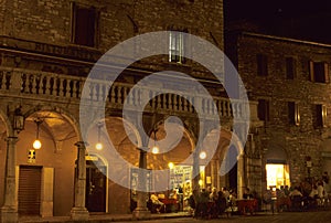 Evening Caf, customers watching the passagiatta. photo