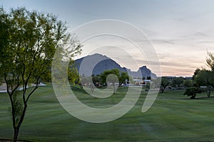 Evening falls over the Scottsdale Greenbelt Park and Camelback Mountain