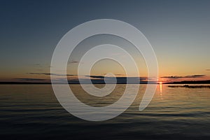 Evening fishing at sunset in silence on the lake