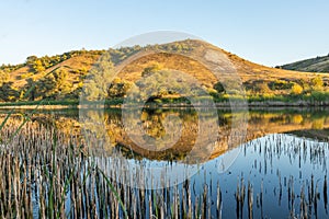 Evening on a floodplain lake near the hills