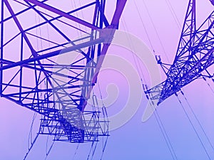 Evening high voltage power lines, electricity tower / pylon, diminishing perspective