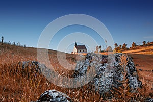 Evening landscape of the famous hill Walberla with the Walpurgis chapel at the franconian suisse in Bavaria in south Germany