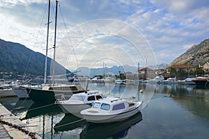 Evening landscape with moored boats in Kotor Bay