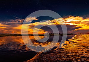 Evening Landscape picture of the Chobe River at the Chobe National Park in Botsuana photo