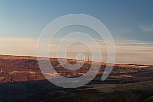 Evening light on hilltop with radio masts