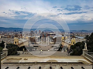 Evening light over plaza espanya and font magica view Barcelona city skyline sunset sunrise warm mountain background