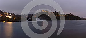 Evening light panorama landscape of the Rhine Falls and Laufen castle in Switzerland with very low water level in late autumn