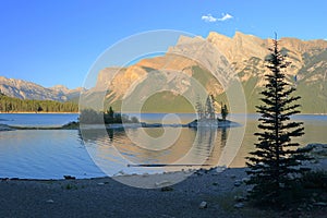 Evening Light on Rocky Island in Lake Minnewanka, Canadian Rocky Mountains, Banff National Park, Alberta, Canada