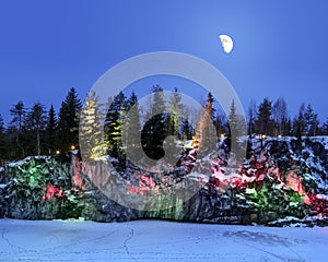 Evening lights in the marble quarry Ruskeala in Karelia in the w