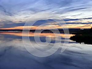 Evening Nadim on the river Nadym. Sunset over the city.