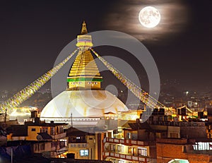 night view of Boudha or Bodhnath stupa with moon