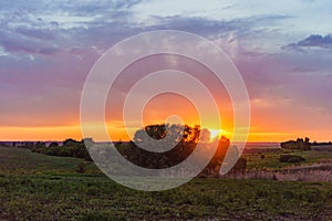 Evening orange sunset over Valday lake, Russia nature landscape photography. Autumn sunset, outdoor nature of Russia