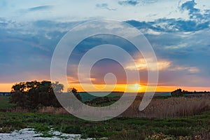 Evening orange sunset over Valday lake, Russia nature landscape photography. Autumn sunset, outdoor nature of Russia