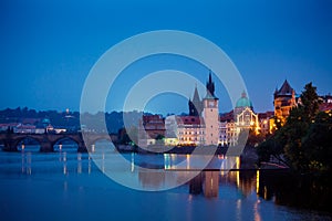 Evening over river Vltava near Charles bridge in Prague