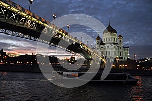 Evening panorama of the Cathedral of Christ the Savior and the Patriarchal bridge across the Moscow River. Autumn in Moscow.