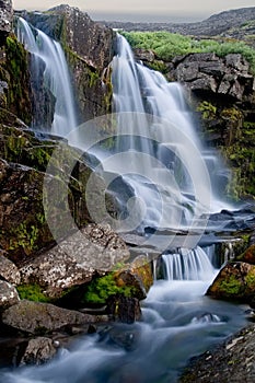 Evening panorama of a falls in mountains