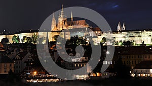 Summer night view from Charles Bridge on St. Vitus Cathedral and the historical part of Prague