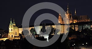 Summer night view from Charles Bridge on St. Vitus Cathedral and the historical part of Prague